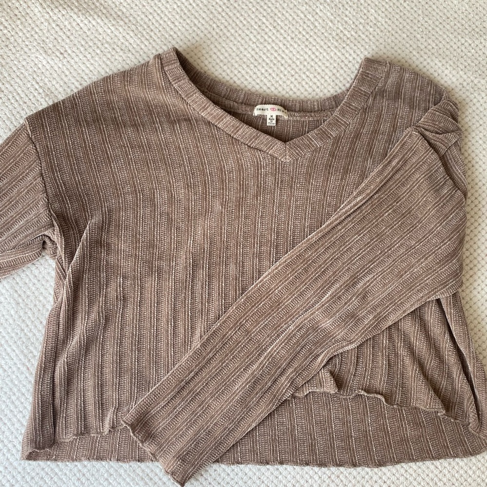 Light brown top. In great condition. V-neck.